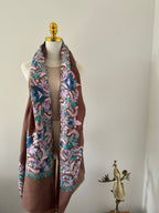 Floral-patterned fabric on a mannequin with a neutral background