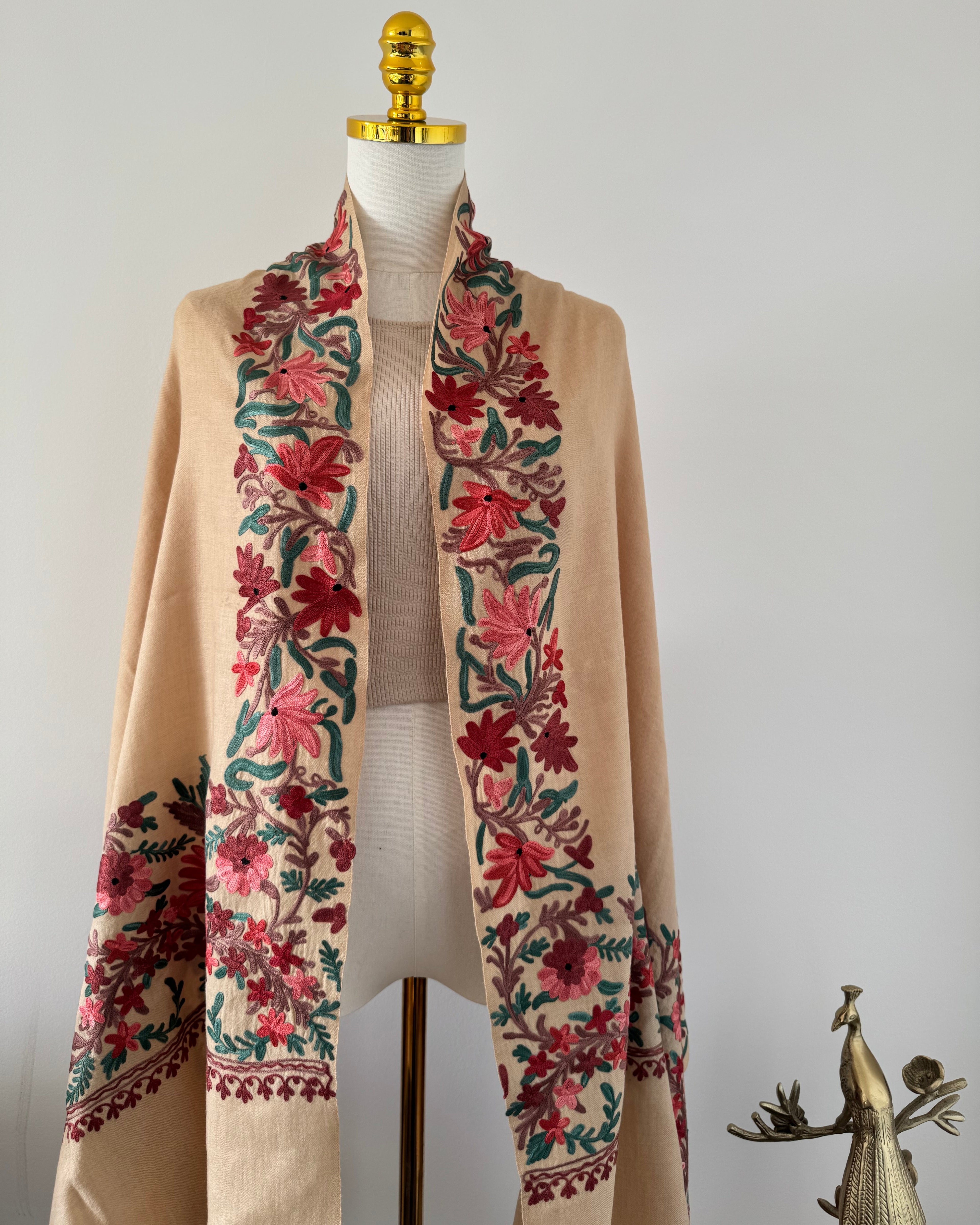 Floral-patterned fabric on a mannequin with a plain background