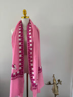 Pink shawl decorative design on a white background