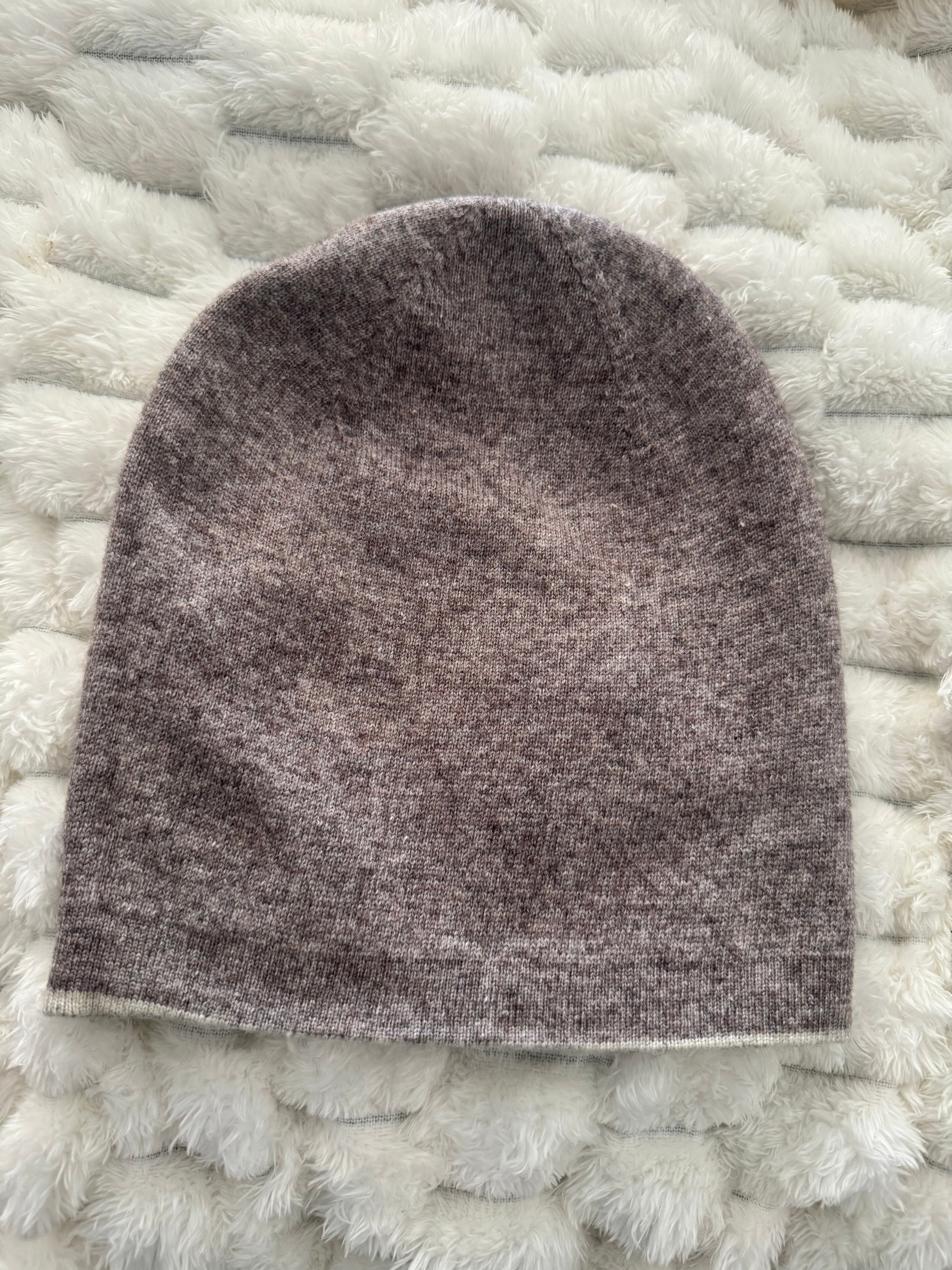 Gray textured object on a textured white surface