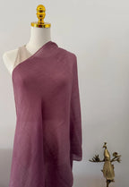 Purple one-shoulder on a mannequin with a plain background