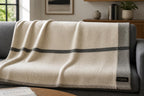 Ivory cashmere throw with grey border and accent stripe